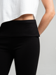 Ref: 0610378 Pantalón flare stretch, tipo legging, pretina plegable, tiro alto, tono negro