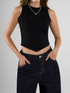 Ref: 0610400 Top rib, cuello redondo, algodón stretch, manga sisa, tono negro