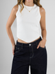 Ref: 0610401 Top rib, cuello redondo, algodón stretch, manga sisa, tono crudo