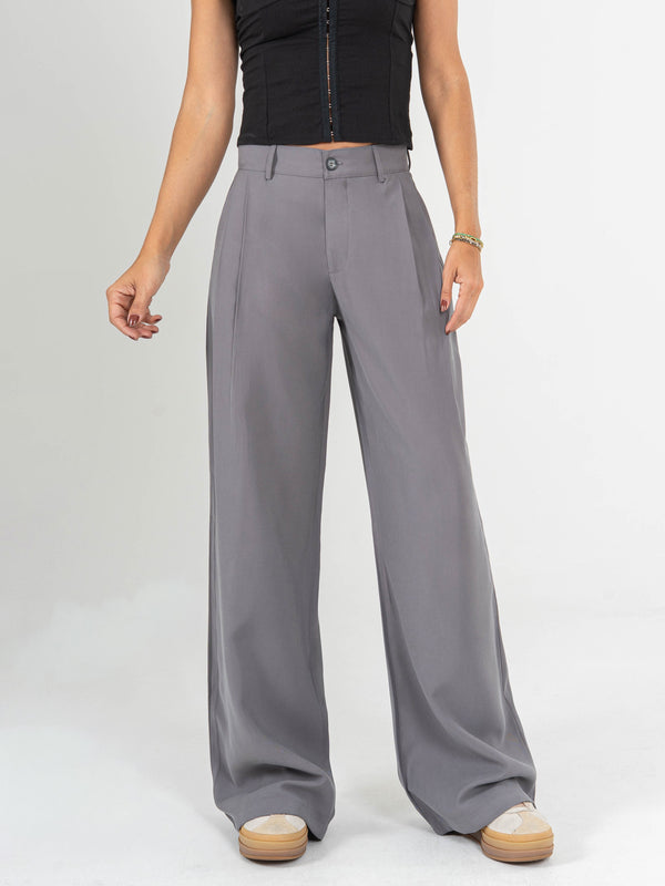 Ref: 0620012 Pantalón palazzo, con prenses, tejido plano liviano, tiro alto, tono gris.
