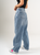 Ref: 065623  Jean barrel, rígido, tiro alto,  diseño cinco bolsillos, tono azul medio