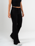Ref: 065664 Pantalón flare stretch, bota ancha, tiro medio, tono negro