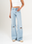 Ref: 065878 Jean mom Flare, rígido, tiro medio, tono azul medio con rotos