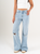 Ref: 065878 Jean mom Flare, rígido, tiro medio, tono azul medio con rotos