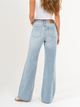 Ref: 065908 Jean mom Flare, rígido, tiro alto, tono azul claro con rotos