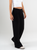 Ref: 069638 Pantalón mom flare, prenses, tejido plano liviano, tiro alto, con resorte en pretina, tono negro
