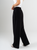 Ref: 069638 Pantalón mom flare, prenses, tejido plano liviano, tiro alto, con resorte en pretina, tono negro