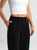 Ref: 069854 Pantalón mom flare, sobrepuesto delantero, tejido plano liviano, tiro alto, tono negro