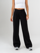 Ref: 069874 Pantalón mom flare, tejido plano liviano, prenses, tiro alto, detalle en pretina, tono negro