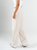 Ref: 069875 Pantalón mom flare, tejido plano liviano, prenses, tiro alto, detalle en pretina, tono arena