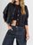 Ref: 0610389 Chaqueta cropped, tono negro, bolsillos con taches y broches delanteros