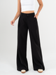 Ref: 069946 Pantalón palazzo, prenses, tono negro, tejido plano liviano, tiro alto