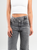 Ref: 065808 Jean mom flare, stretch, tiro alto, tono gris medio, detalle en pretina