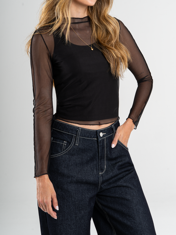 Ref: 0610459 Top manga larga, cuello alto, en malla, tono negro.