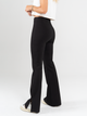 Ref: 0610354 Pantalón flare stretch, tipo legging, tiro alto, tono negro, detalle abertura al costado