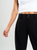 Ref: 069614 Pantalón slouchy, sin prenses, tono negro, tejido liviano, tiro alto, bolsillo ribete