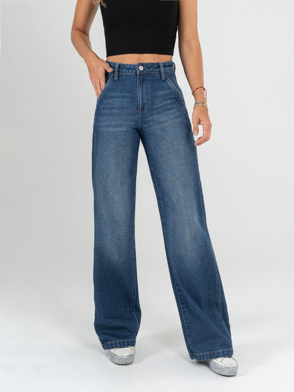 Ref: 064931 Jean Mom Flare, rígido, cortes en pierna, tiro alto, tono azul medio oscuro.