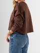 Ref: 0610430 Buzo oversize, manga larga, con cortes, cuello redondo en rib, tono cafe