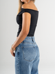 Ref: 0610464 Top cuello bandeja, stretch, fondo entero, tono negro.